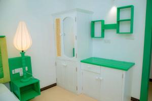 a bathroom with a sink and a mirror at Norea Sands in Bentota +50 photos