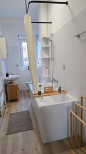 a white bathroom with a sink and a mirror at Altstadtnähe Sauna-Infrarot 2 Schlafzimmer in Koblenz +53 photos