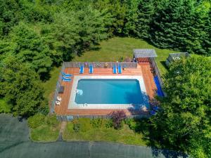 an overhead view of a swimming pool in a yard at The Euphrates in Cavendish