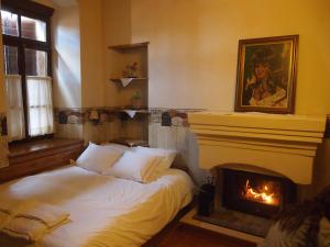 Postel nebo postele na pokoji v ubytování Guesthouse Kazakou