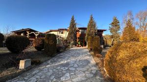 a stone path in front of a house at Kulata Predel in Razlog