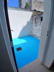 an open door with a blue floor in a room at Linda Goya in Goya