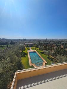 an aerial view of a swimming pool on top of a building at Villa in Aït Bou Zguia