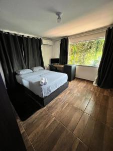 Foto de Pousada encanto da fronteira quarto 9