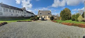 a car parked in front of a building at Ti Ar Skol, chambre d'hôtes in Huelgoat +13 photos