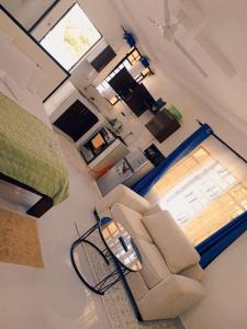 an aerial view of a living room with a couch at Diani Beach Studio with Pool, Beach Access in Diani Beach