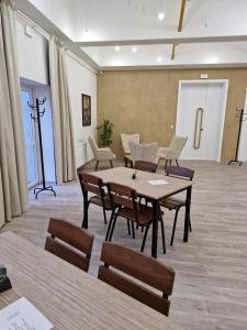 a conference room with a table and chairs at Ubytování Hilšer in Potštát