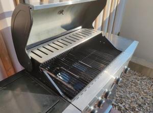 a grill sitting on top of a table at Mobile Home Annika Mar in Selce