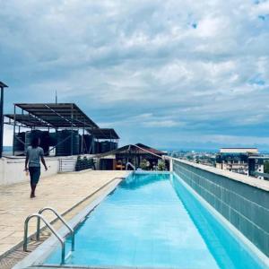 a person walking on the roof of a building at Shiela inn in Nairobi