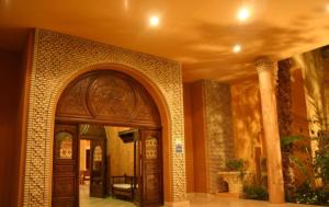 an entrance to a building with an archway at Ksar El Jerid in Tozeur