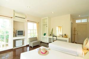 Voodi või voodid majutusasutuse Makathanee Resort toas