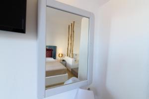Postel nebo postele na pokoji v ubytování Atlas Boutique Hotel