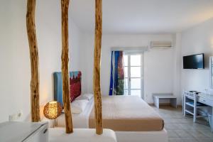Postel nebo postele na pokoji v ubytování Atlas Boutique Hotel
