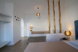 Postel nebo postele na pokoji v ubytování Atlas Boutique Hotel + 37 fotografií
