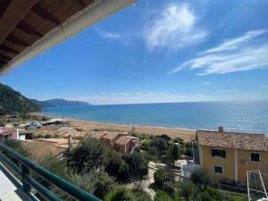 a view of the ocean from a balcony at Glyfada Seaview Home 126 by New Era in Glyfada
