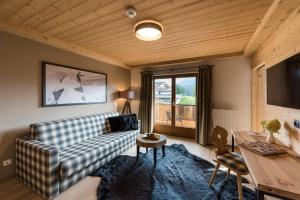 Televiisor ja/või meelelahutuskeskus majutusasutuses Hotel Winterbauer