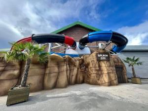 a water slide at a water park at Lily's caravan in Meliden