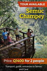 a group of people standing on a bridge over a river at Casamar in Cobán