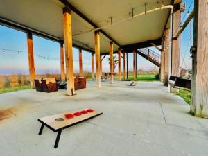 a wooden cutting board on the floor of a building at Pelican Pointe Home for 10 in Bolivar Peninsula
