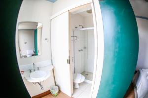 Koupelna v ubytování Hotel Pousada da Mangueira + 45 fotografií