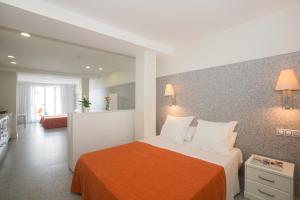 Postel nebo postele na pokoji v ubytování Apartamentos Turísticos Mix BR AT2179