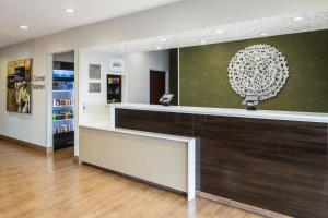 a lobby of a store with a reception counter at Fairfield Inn by Marriott Richmond in New Paris +17 photos