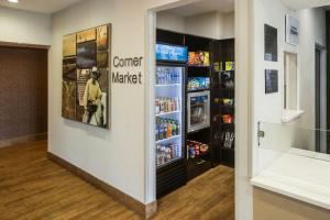 a store entrance with a corner market refrigerator at Fairfield Inn by Marriott Richmond in New Paris