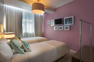 Letto o letti in una camera di Chic Studios