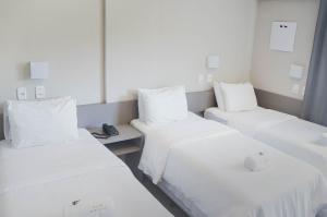Postel nebo postele na pokoji v ubytování Work Hotel Design
