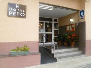 The facade or entrance of Hotel Pepo