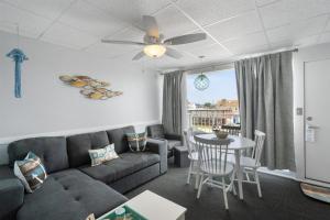 a living room with a couch and a table at 6701 Atlantic Ave, Unit 301 in Wildwood Crest