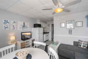 a living room with a couch and a table at 6701 Atlantic Ave, Unit 301 in Wildwood Crest