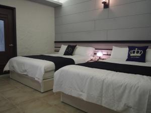 Postel nebo postele na pokoji v ubytování Successful 168 B&B