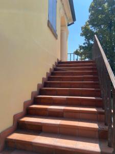 a set of stairs leading up to a building at B e B Villa Livia in Rolo