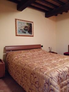 Posteľ alebo postele v izbe v ubytovaní Agriturismo Il Melo