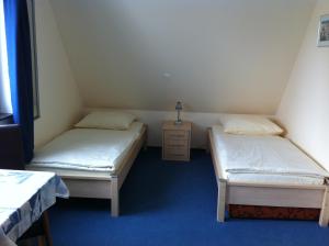 Uma cama ou camas num quarto em Hotel Appart