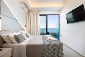 TV tai viihdekeskus majoituspaikassa Poseidon Hotel