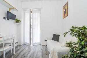Area soggiorno di The Best Rent - Cozy Apartment Milan