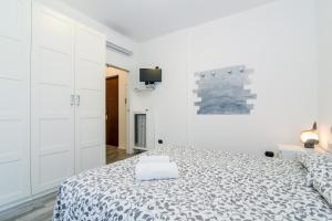 Letto o letti in una camera di The Best Rent - Cozy Apartment Milan