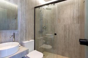 Kylpyhuone majoituspaikassa Poseidon Hotel 77 kuvaa lisää