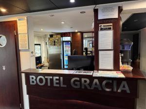 a sign for a hotel grandariaasteryasteryasteryasteryasteryasteryasteryasteryastery at Botel Gracia in Bratislava