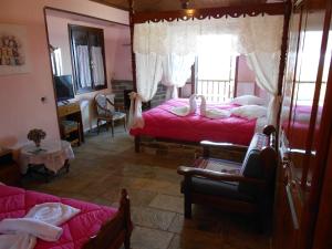 Postel nebo postele na pokoji v ubytování Diogenis Hotel