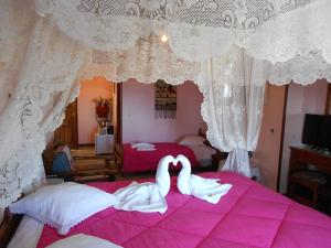 Postel nebo postele na pokoji v ubytování Diogenis Hotel