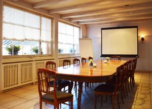 
Der Geschäftsbereich oder Konferenzraum in der Unterkunft Auberge de Vers chez Perrin
