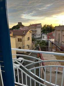 a view of a city from a balcony at B&B Santorini in Scalea