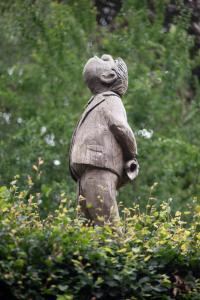 a statue of a person standing in a field at Heideidyll - Wohnung mit WLAN, Balkon, Grill & Garage in Schneverdingen +36 photos