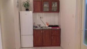 Kuchyň nebo kuchyňský kout v ubytování Apartmány Karlštejn