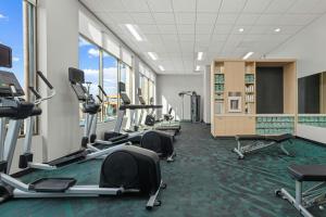 a gym with treadmills and elliptical machines at TownePlace Suites by Marriott Murfreesboro in Murfreesboro