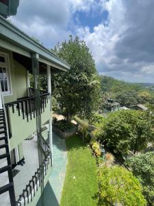 a view from the balcony of a house at Peak Lodge in Kandy +39 photos