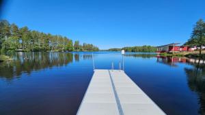 a dock in the middle of a lake at Ankis i Virserum in Virserum
